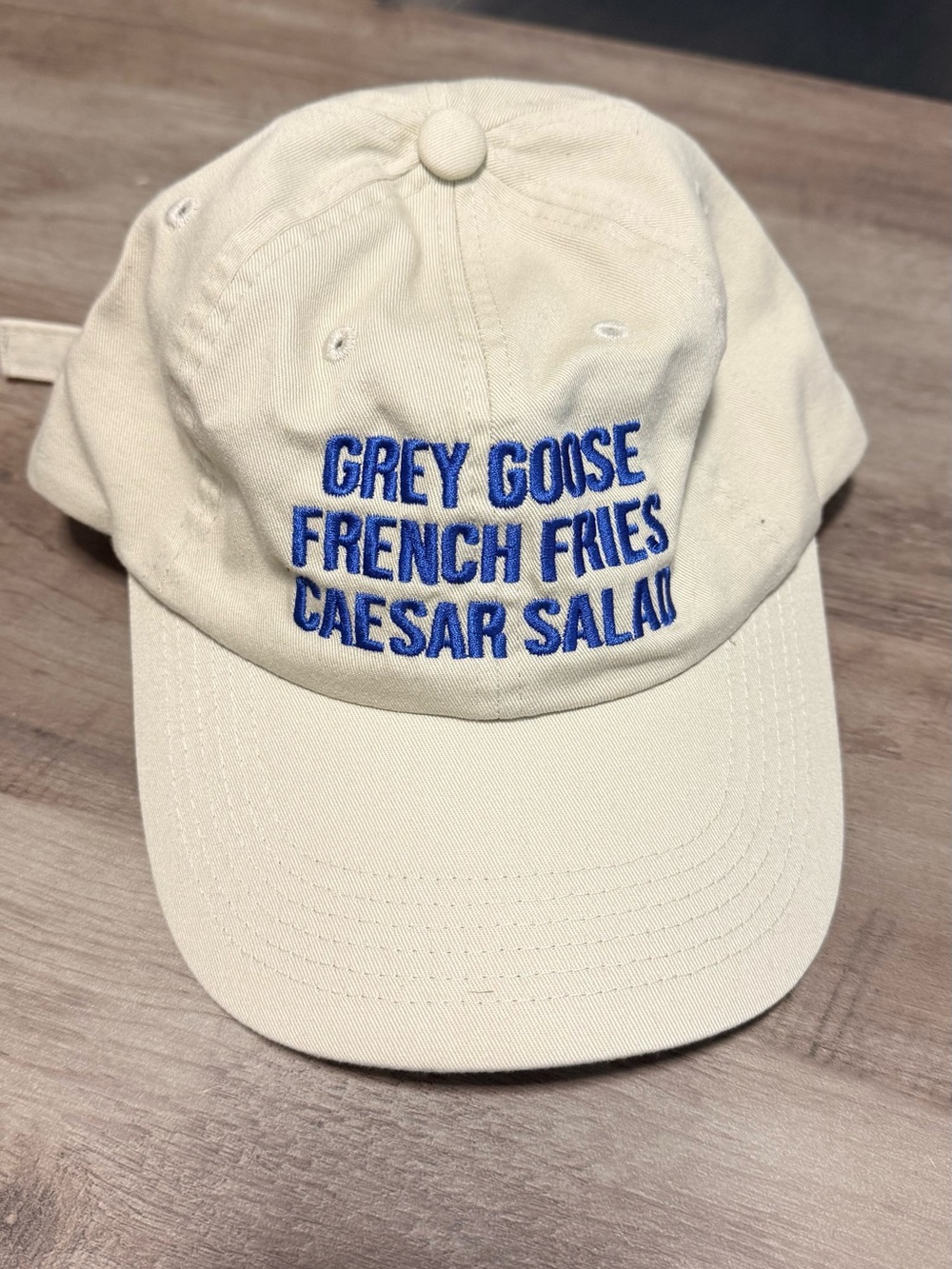 Grey Goose Cream Baseball Cap with Blue Embroidered Text